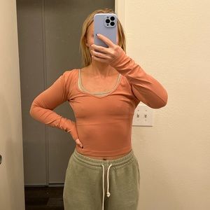 Lululemon athletic shirt, size 4. Worn once, great condition. Peach/orange.